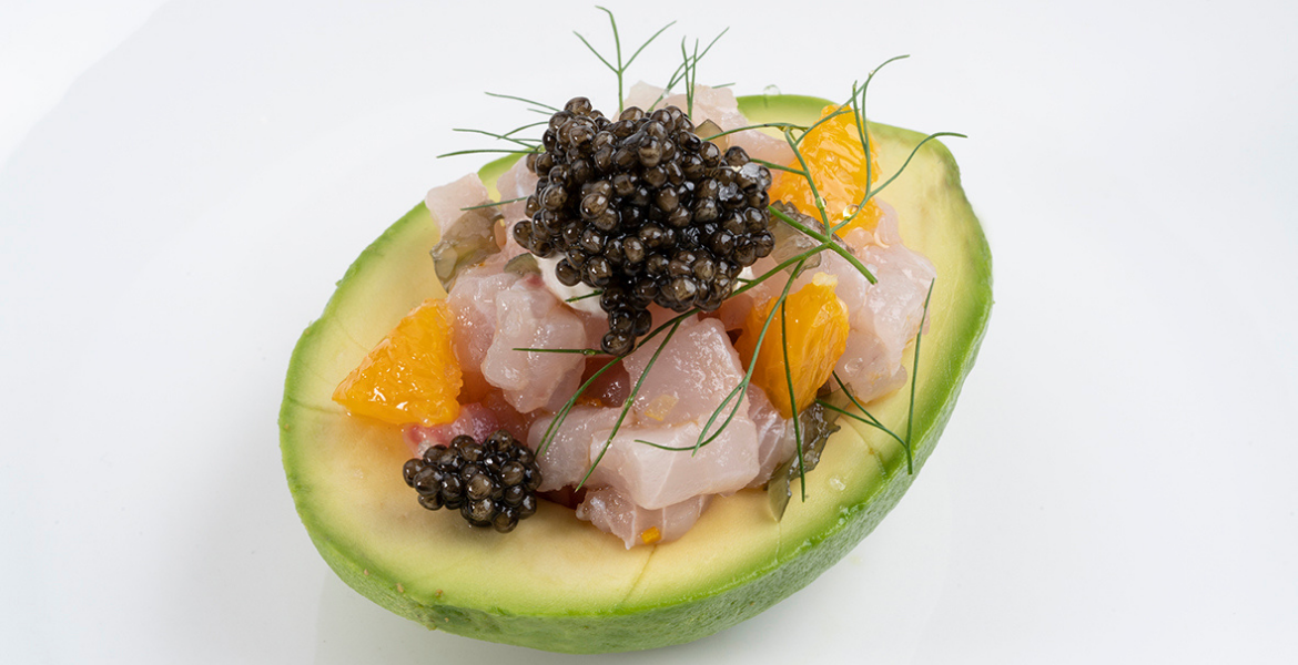 White sturgeon tartare, avocado and burrata with orange aroma and Cru Asetra Caviar